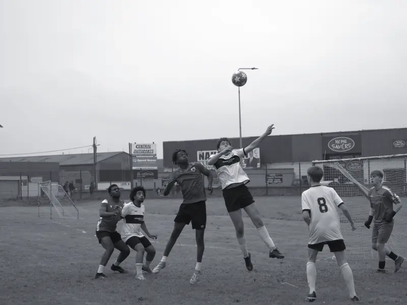 Players compete for a loose ball at the 2024 tournament